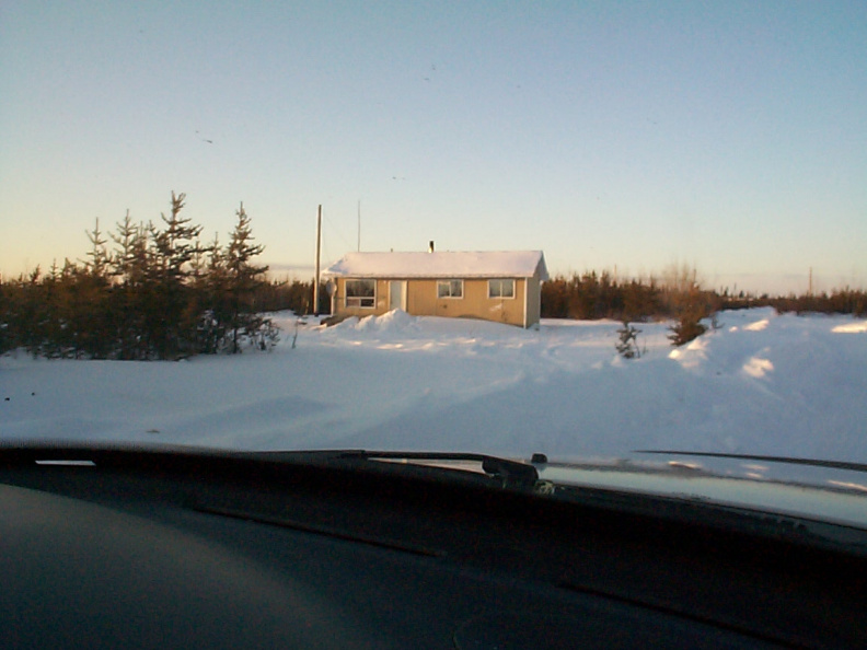 Once you come up from the winter road to the community of Koocheching. This is the first house you will see.