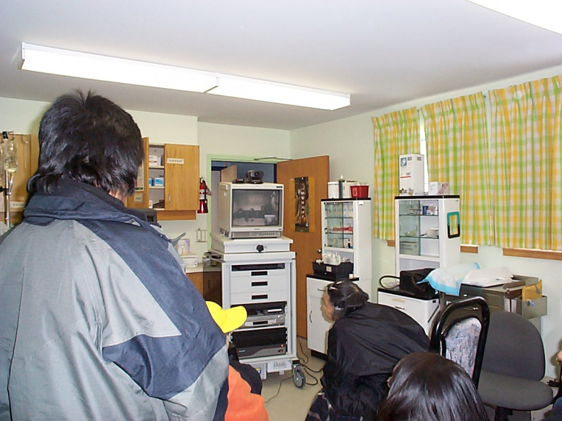 Tony and my Mom (Tason)visiting Reynold, George and Catherine via televideo at the Poplar Hill examinaton room #1.