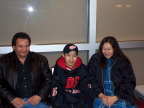 Reynold with his mom and dad at the airport in Thunder Bay on his way home