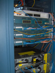 Old routers and switches in the K-Net cabinet.