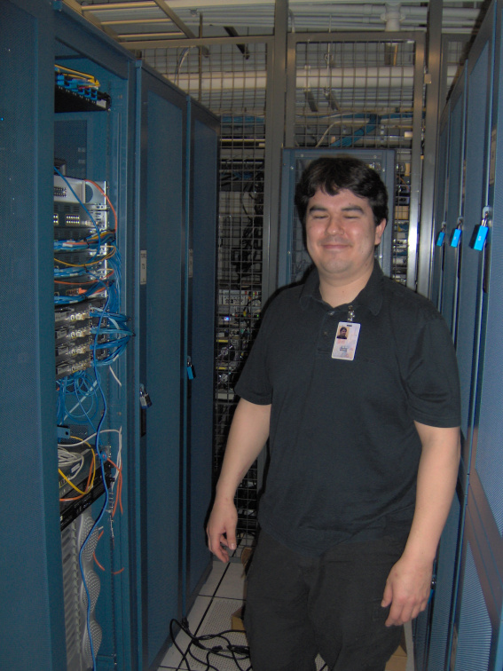 Terence posing beside the rack cabinet.