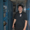 Terence posing beside the rack cabinet.