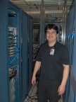 Terence posing beside the rack cabinet.