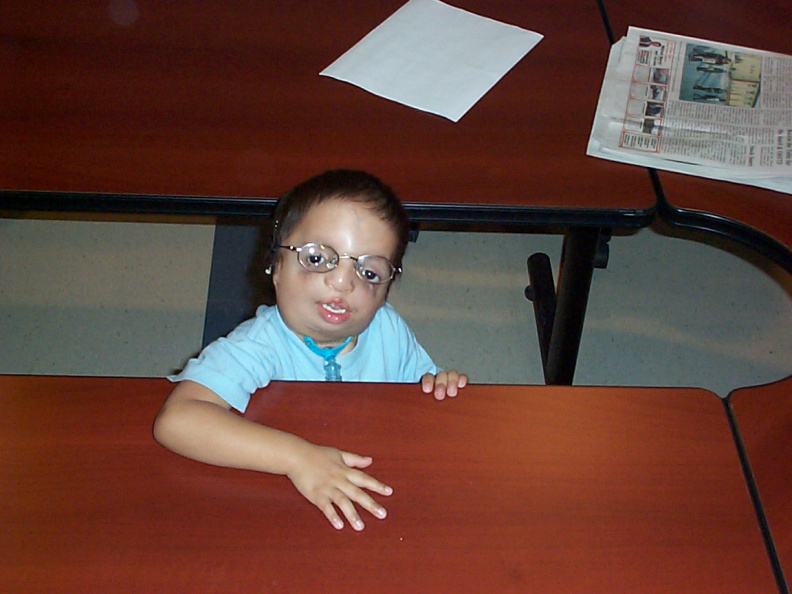 Sameul Meekis stands in between the K.O. Conference tables, waiting for demonstration of Patient camera