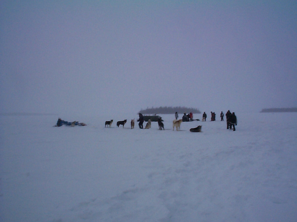 And here wer are down the lake in Keewaywin. I can barely see, but up there is their campsite.