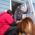 Here he is petting one of the dogs.