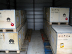 Warehouse with 18 crates (6 sites) from the first shipment