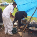 Wayne and Davie cooking fish