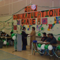 Another student recieving diploma.Congratulations to all graduates.