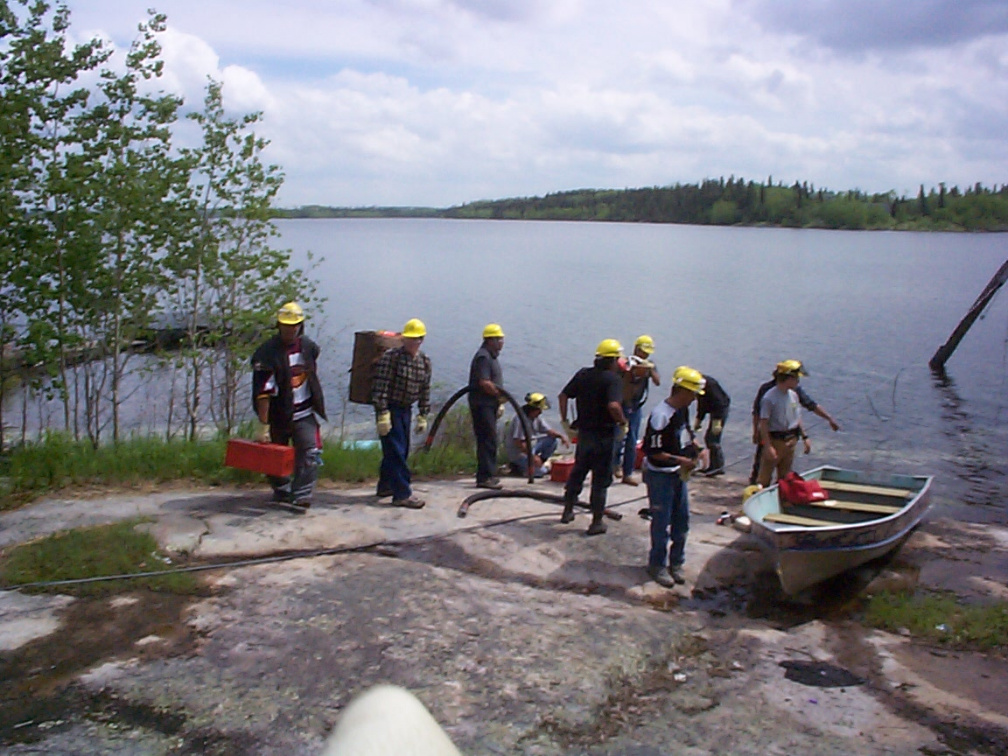 Here are there guys going down the lake to set up a pump,first timers for some of them.