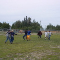 The men coming to the home stretch,3legged race.
