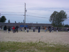 The ladys ballon toss ,they put water in the ballon and toss it back and forth until the last pair standing.Water ballon toss.