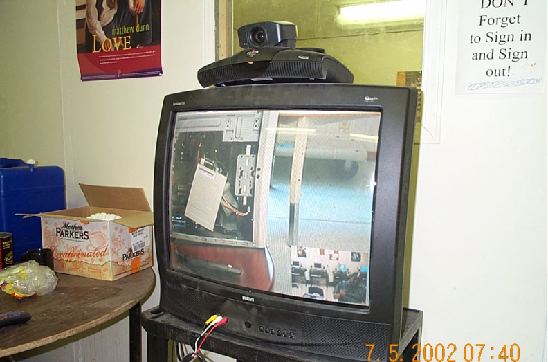 Fort Severn Technician zooms in on a computer in Deer Lake.