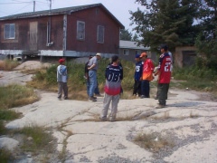 Another picture of the geologist explaining about the rock.