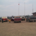 A few more vehicles waiting at the airport.