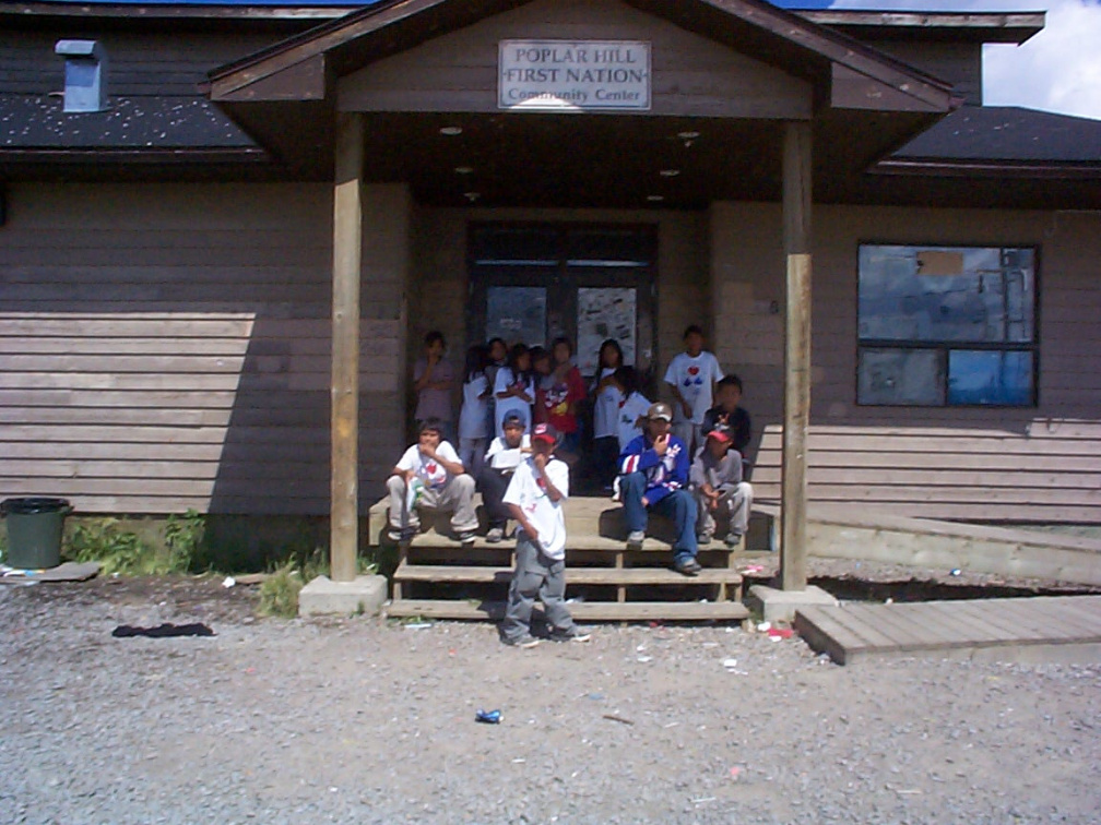 These are more kids,waiting at the front
door.The bible school took place in the
gym.