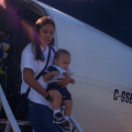 Crystal Meekis and her son getting off the plane