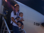 Crystal Meekis and her son getting off the plane