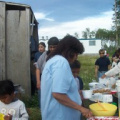 Rita serving the hungry people.
