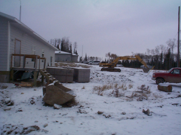 Waiting for our community hall to be completed
