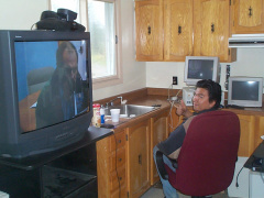 Here we can see the polycom being put to use as our computer technician(Paul) gets some assistance from Dan Pellerin in Soux Loo