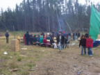 Now the food is almost ready. The people all make their way to the table