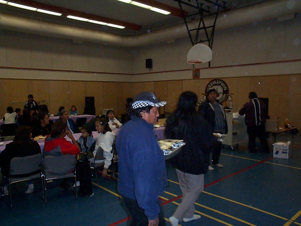 here's the school custodian Skip Kakegamic bringing in the food.