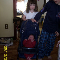 Matthew doesn't like Rebecca's doll stroller.