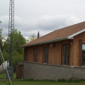 Side View of the back.  There's a big white dish and a tower behind the school.