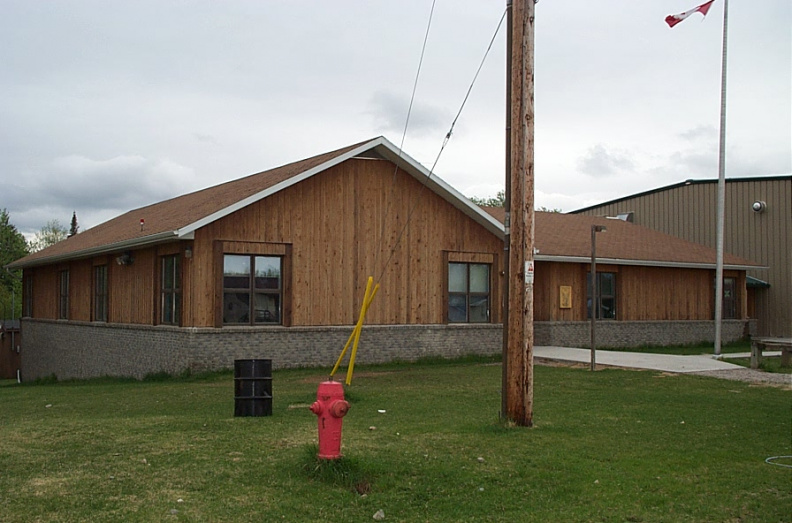 Front of the Wabshki Penasi School in Wabigoon First Nation.  The window to the left is the computer room.