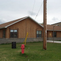 Front of the Wabshki Penasi School in Wabigoon First Nation.  The window to the left is the computer room.