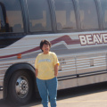 Joyce stands by the bus for a picture.
