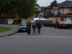 Geraldine walking over with her exchange parent, and student exchange.