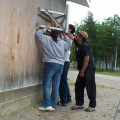 Angie, Cal and Ron drilling in the mount.