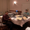 Harvey Yesno and Terry Moreau setting up the Internet Cafe