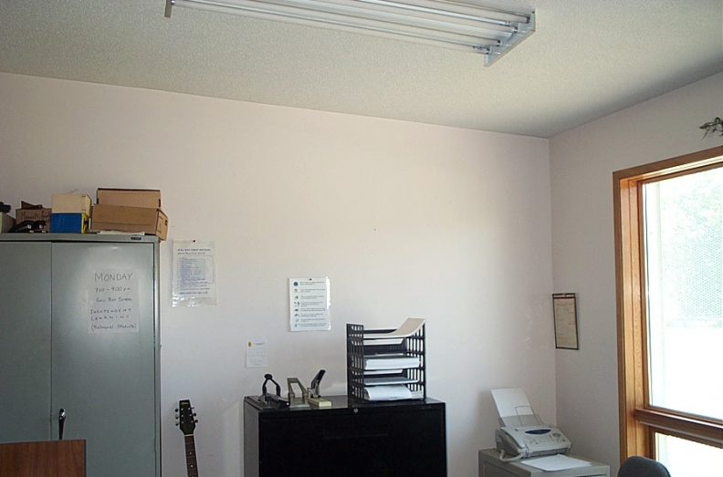 The tiny administration room. This is where we'll be poking the bolts through. Behind the cabinet. - aai.jpg aai.jpg