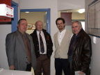 People from Education, Health, and local Government discussing the use of ICTs in the new building.