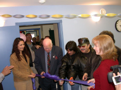 Ribbon Cutting by the Mayor, Raymond Mason, Patrick Owen, and Tom Bressette.