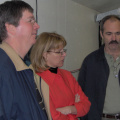 Mike Collins and Elaine Robichaud learn about the operation hub of the 7.4M dish from Dan Pellerin