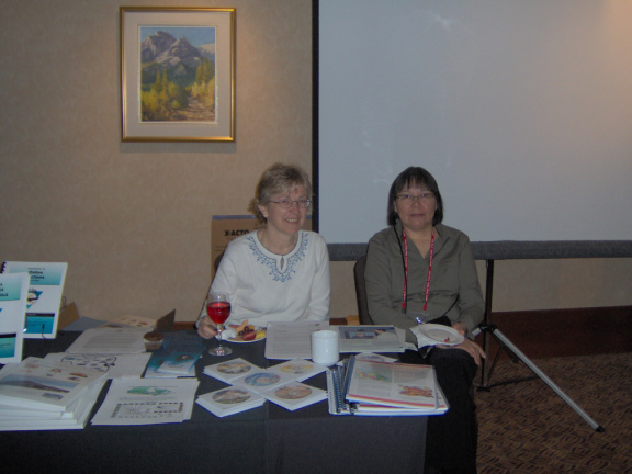 Sheraton Seibel and Lorraine Kenny at the Keewaytinook Okimakanak / FedNor table at the APEC Tel 2006 conference in Calgary
