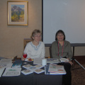 Sheraton Seibel and Lorraine Kenny at the Keewaytinook Okimakanak / FedNor table at the APEC Tel 2006 conference in Calgary