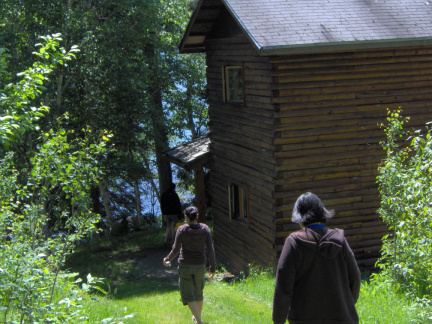 The two storey log structure contains the two bedrooms, the stairway and the entrance way