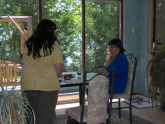 Lorraine and Sandy at the dining room table from the living room