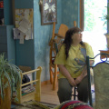 Sandy Buck, the current owner, in her living room