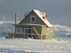 Houses on floats frozen into the lake