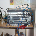 Closeup of the routing equipment.
The Cisco 2621 is configured to provide a simulated T1 frame-relay connection to the uBR7223.