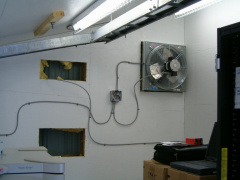 The exhaust fan and the holes where the air conditioner will be installed