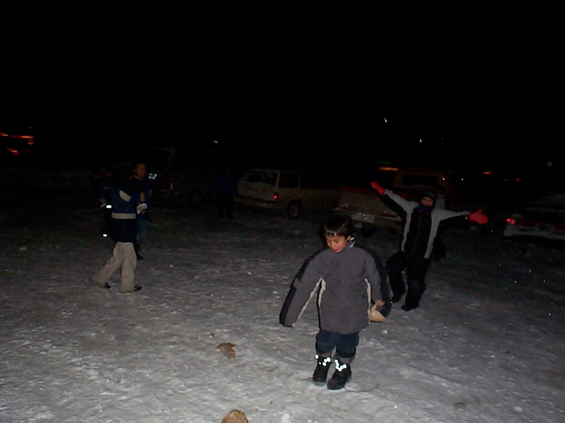 A poor shot of the kids playing outside the church.