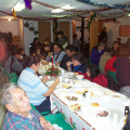 On the left hand corner is the oldest resident of Keewaywin. At 102 years old he still eats with the best.