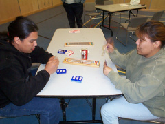 Russell playing against Charlotte Kakegamic all Keewaywiners.
